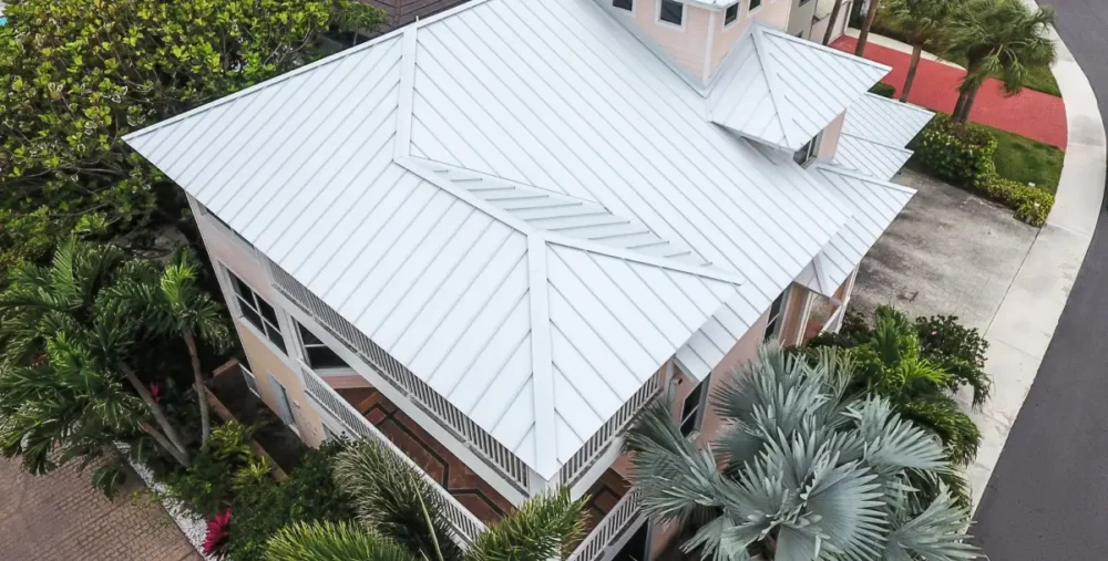 Dynamic Metals Roofing Services - White Metal Roof on Large House